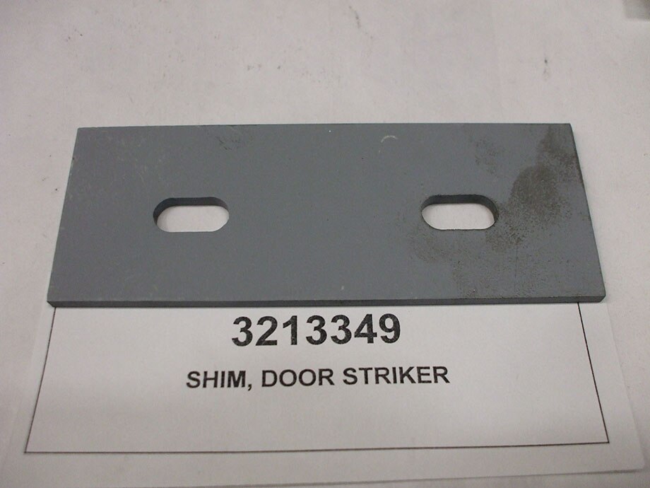 SHIM, DOOR STRIKER